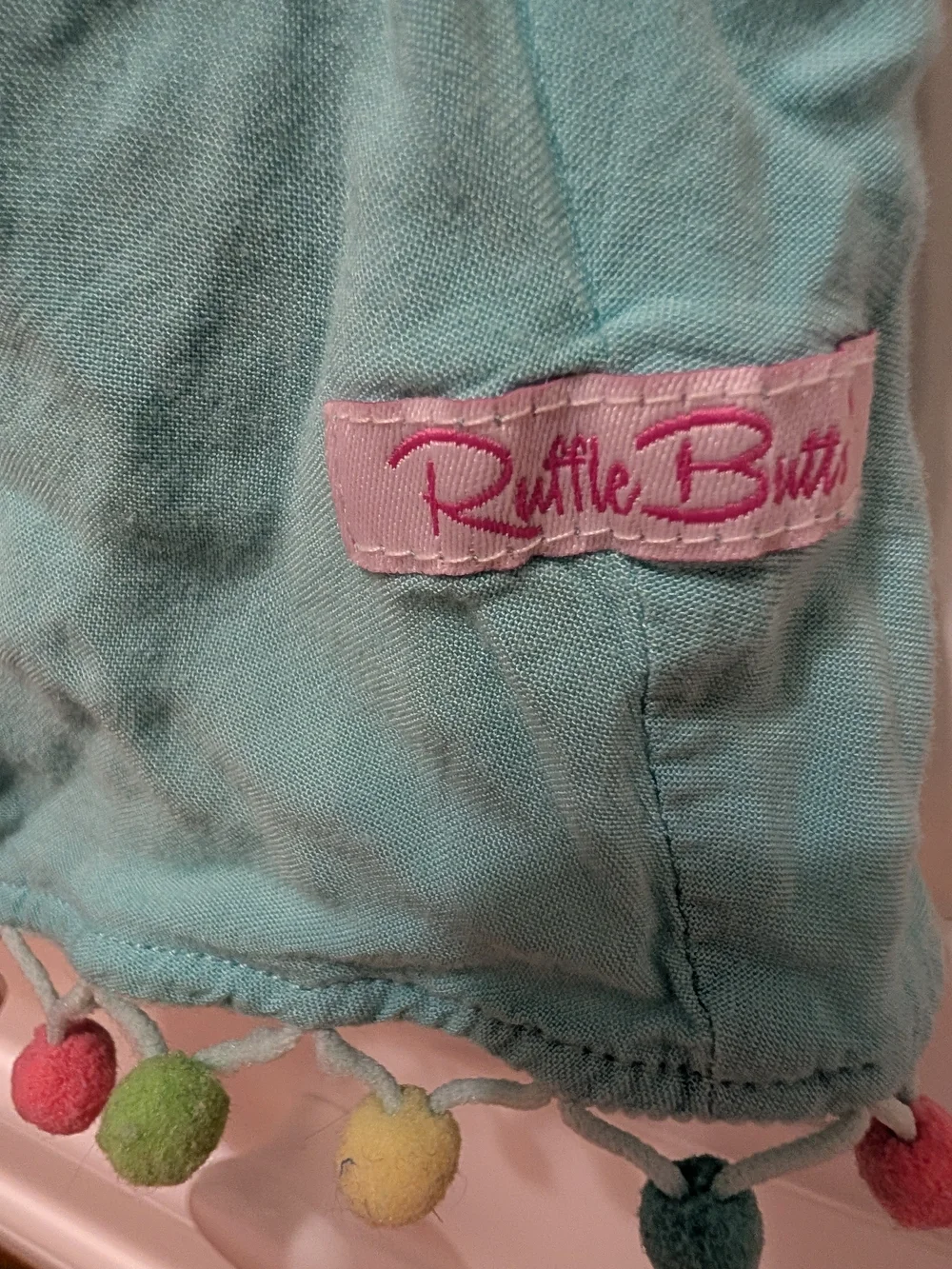Ruffle Butts Baby Girls Aqua Pom Pom Cover Up 0-12 Months